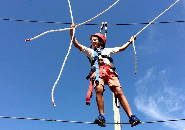 student-on-high-wires-at-camp