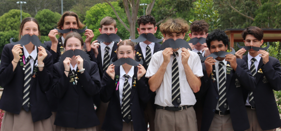 Students get behind Movember by growing Mo's and moving